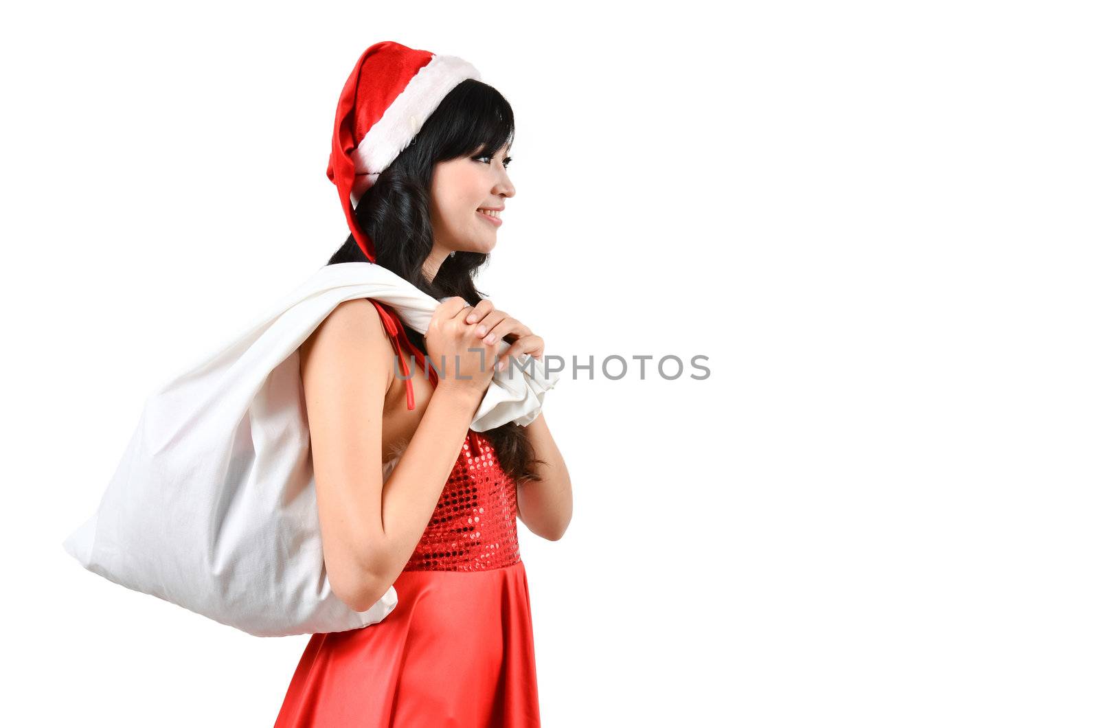 Santa woman  holding a white bagisolated a on white background