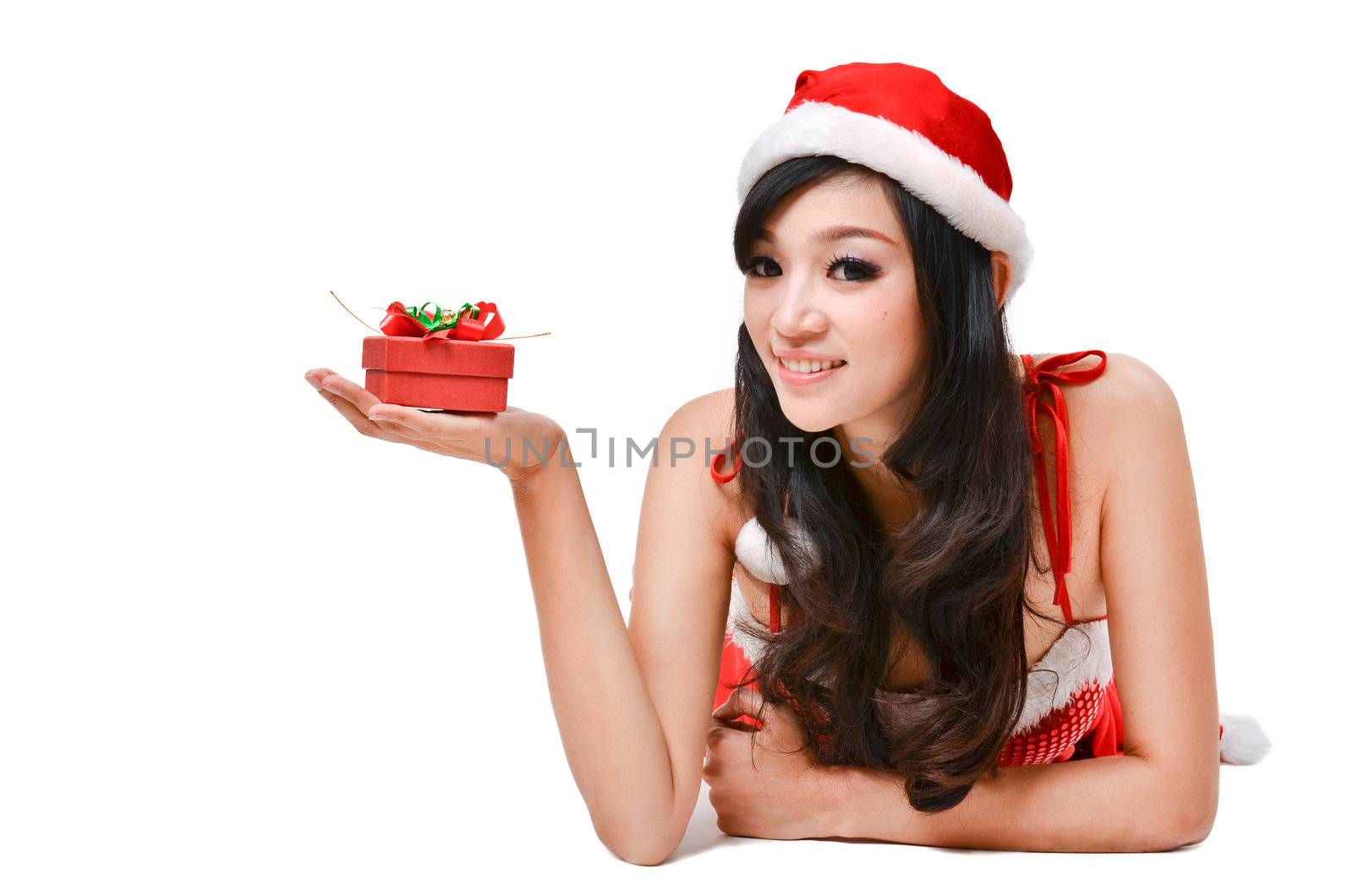 Santa woman  holding a gift box isolated on white background