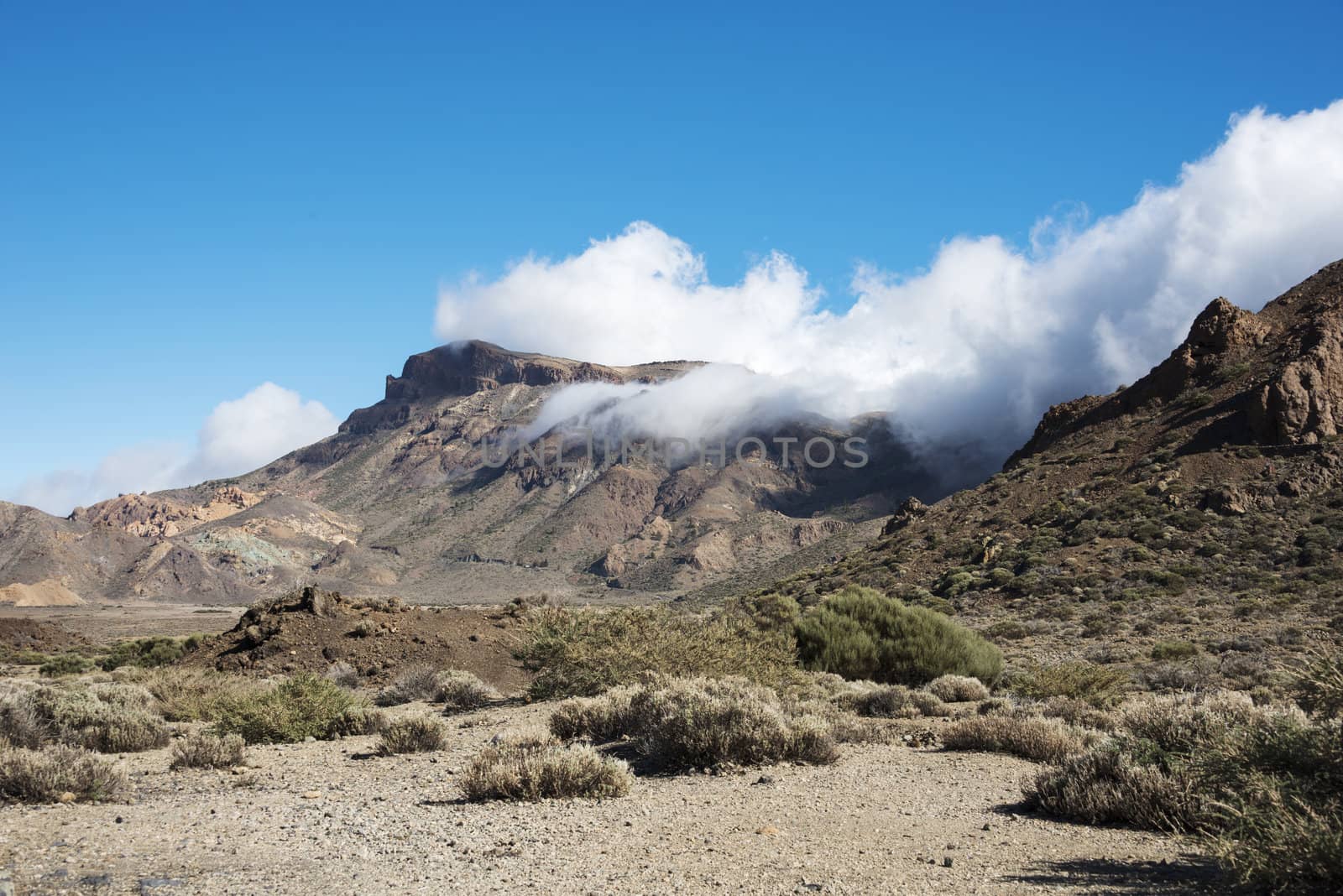 clouds over the mountains in nature parc de Teide on Tenerife