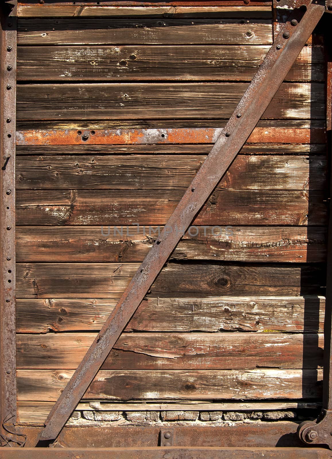 Old railway brown wooden wagon side  as background