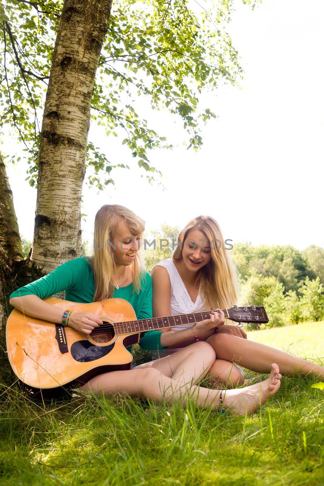 Two girls are having fun in the summer sun