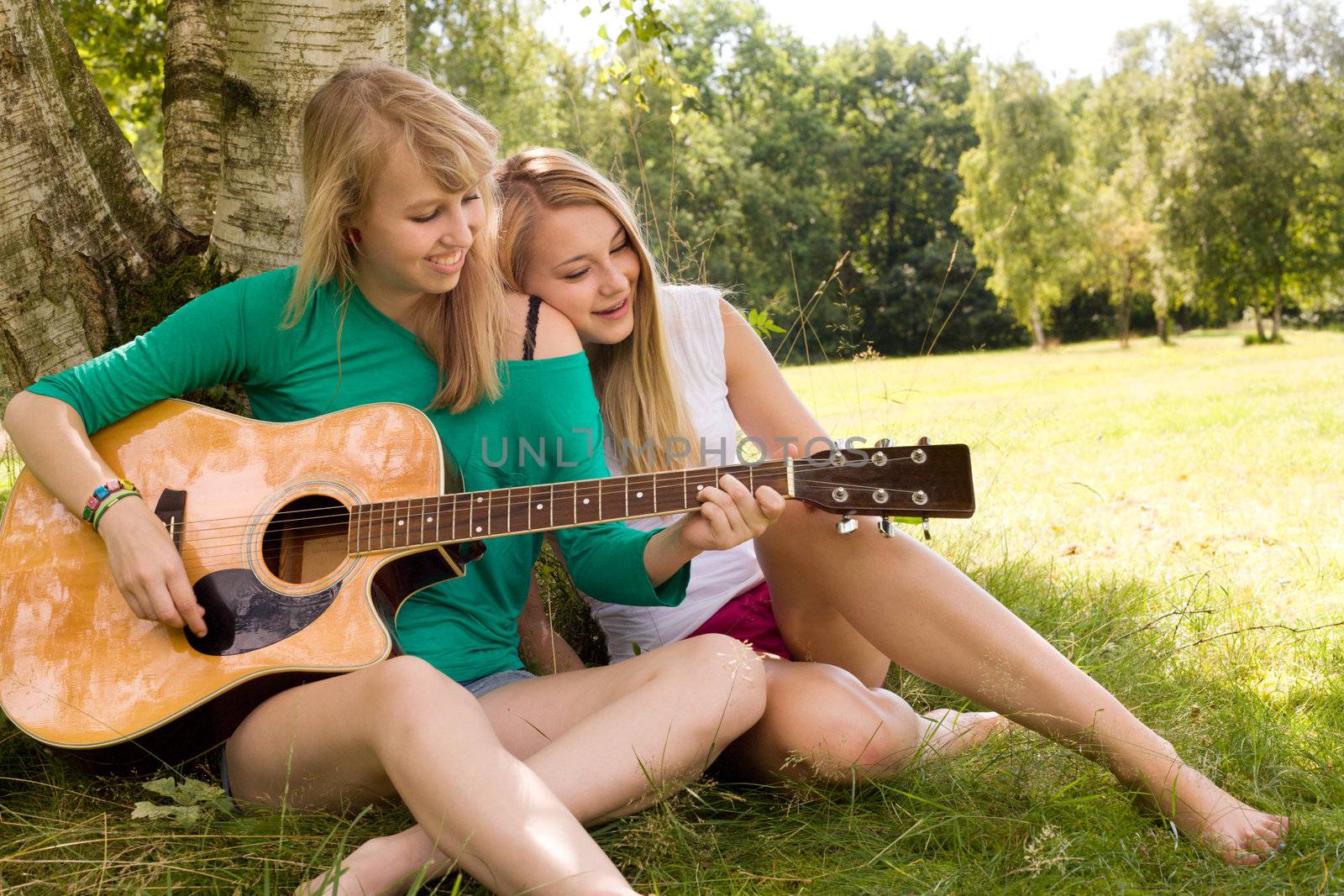 Two girls are having fun in the summer sun