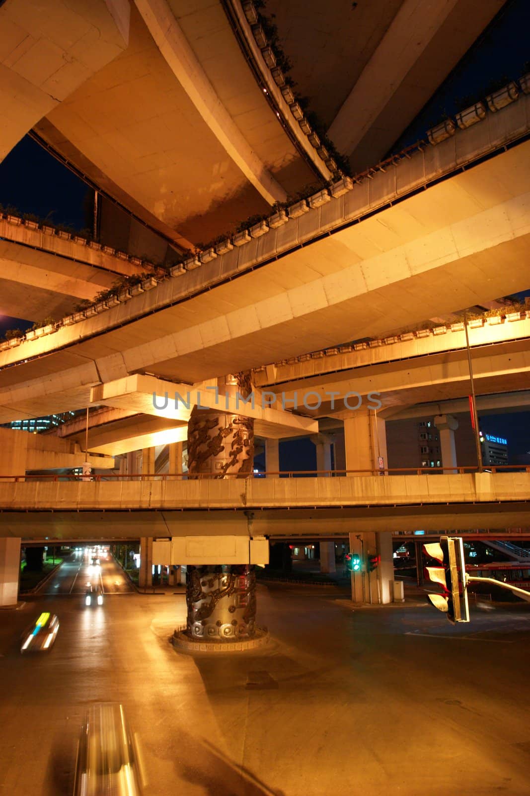 a motorway interchange in shanghai by night a motorway interchange in shanghai by night