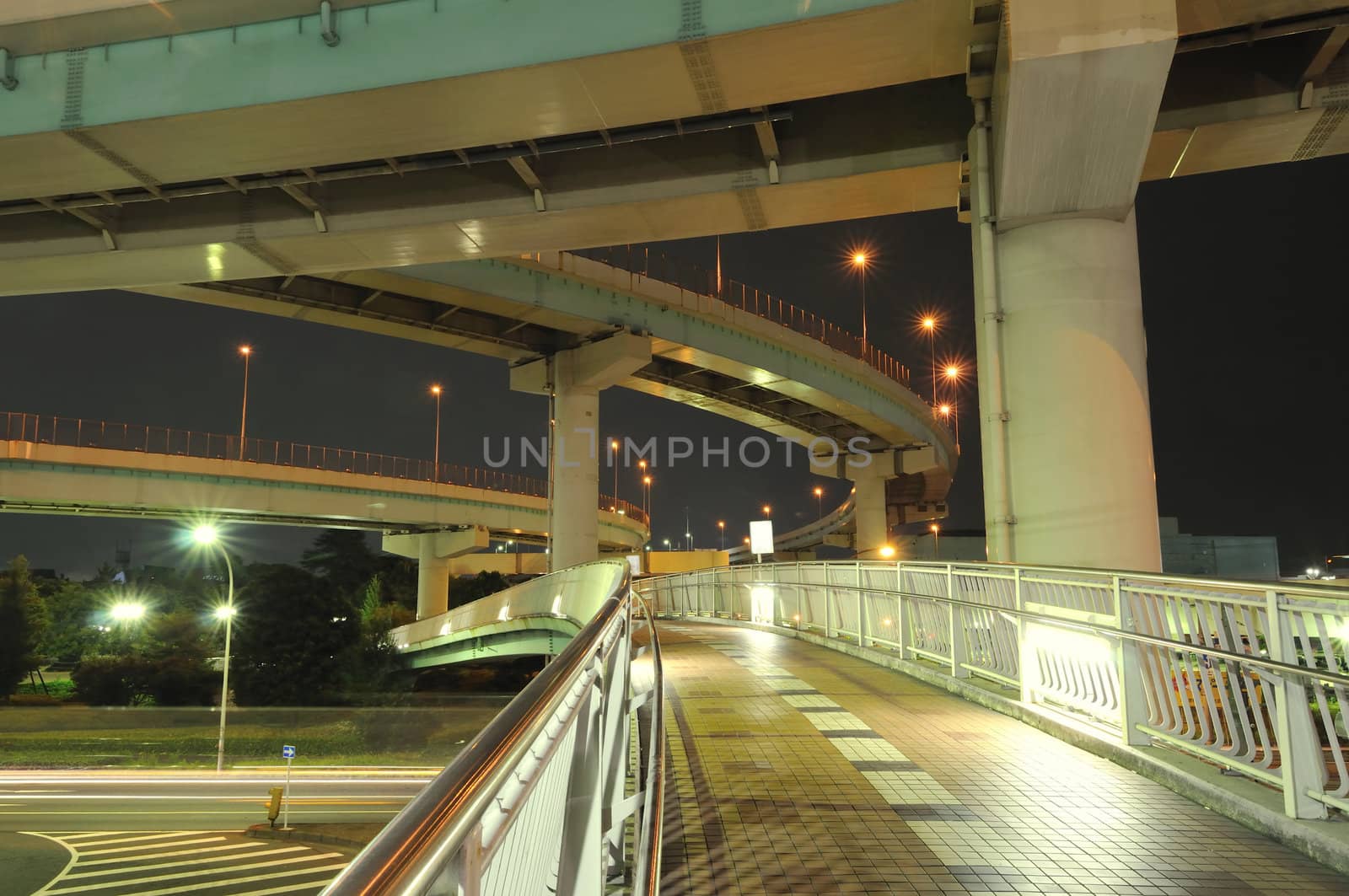 wide-angle night image of well and high density organized Japanese urban roads area