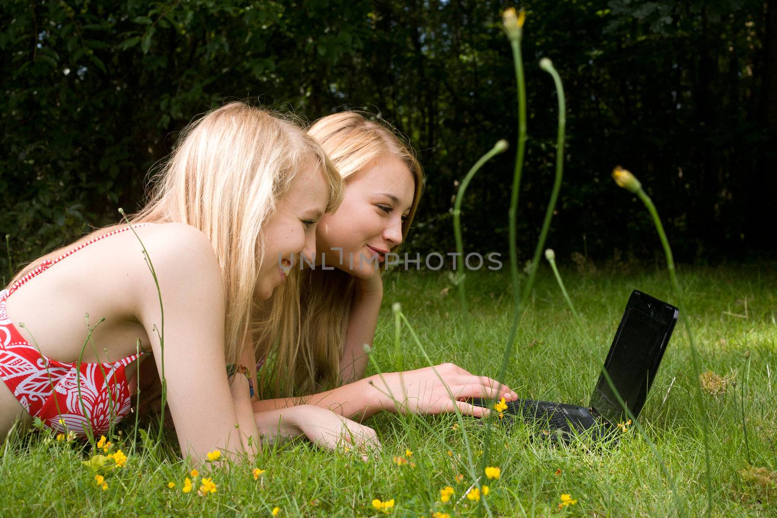 Girls on the laptop by DNFStyle
