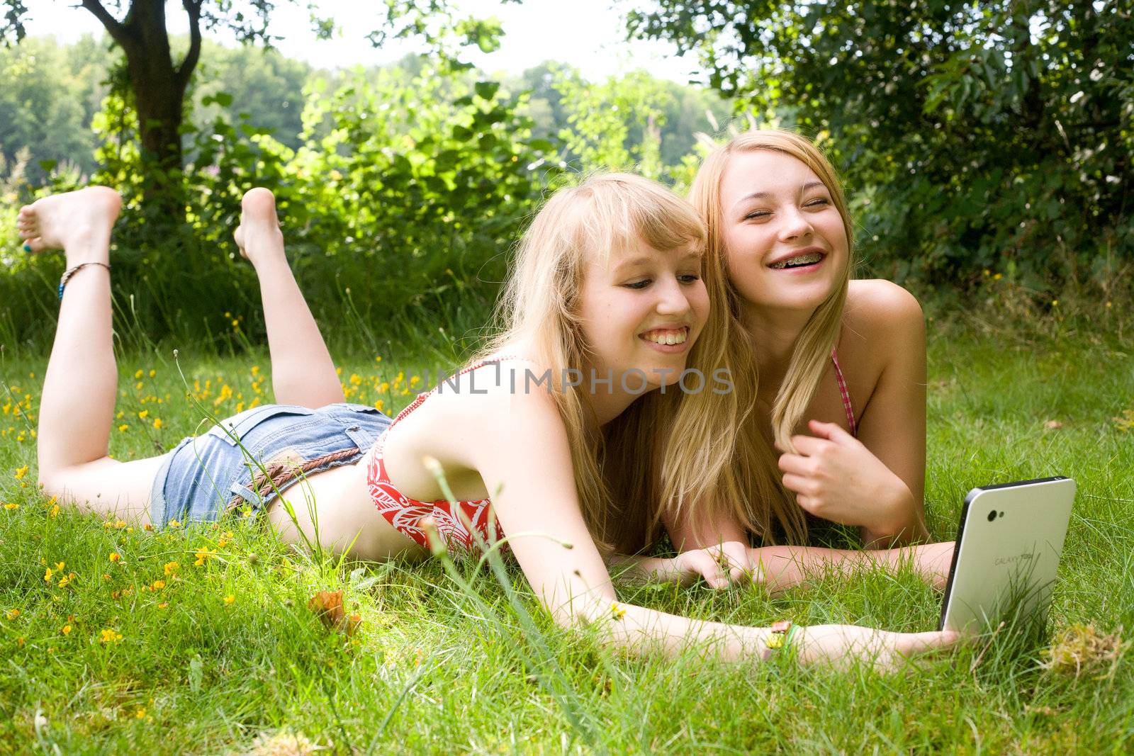 Two girls are having fun in the summer sun