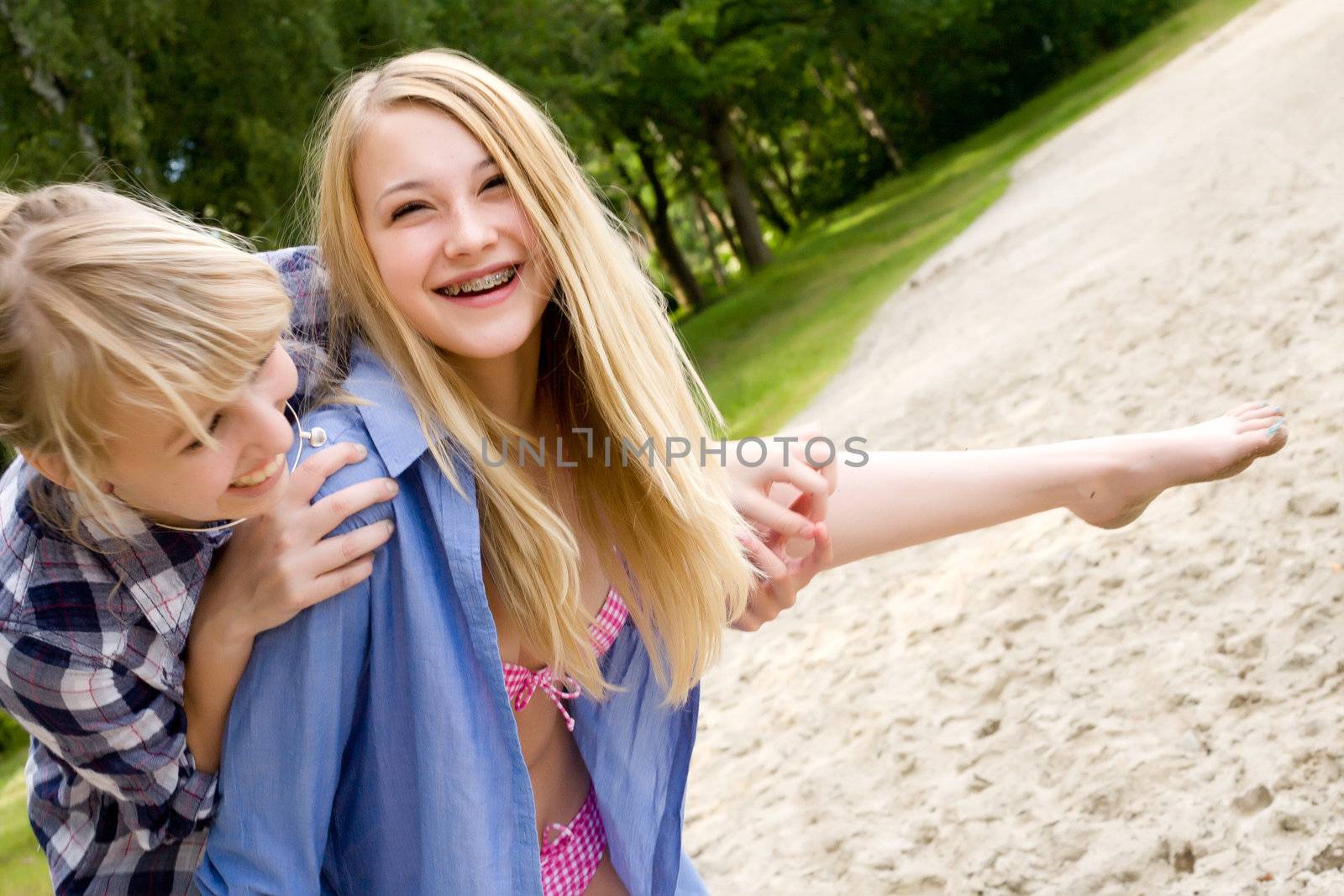 Two girls are having fun in the summer sun