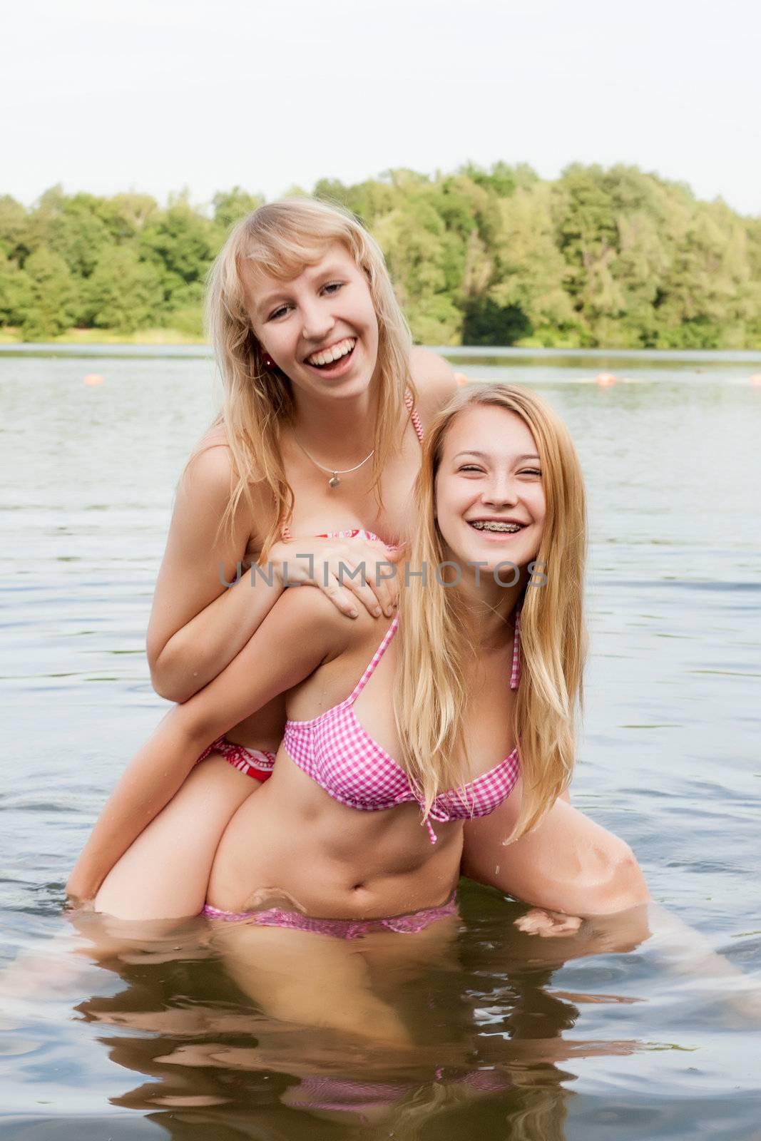 Two girls are having fun in the summer sun