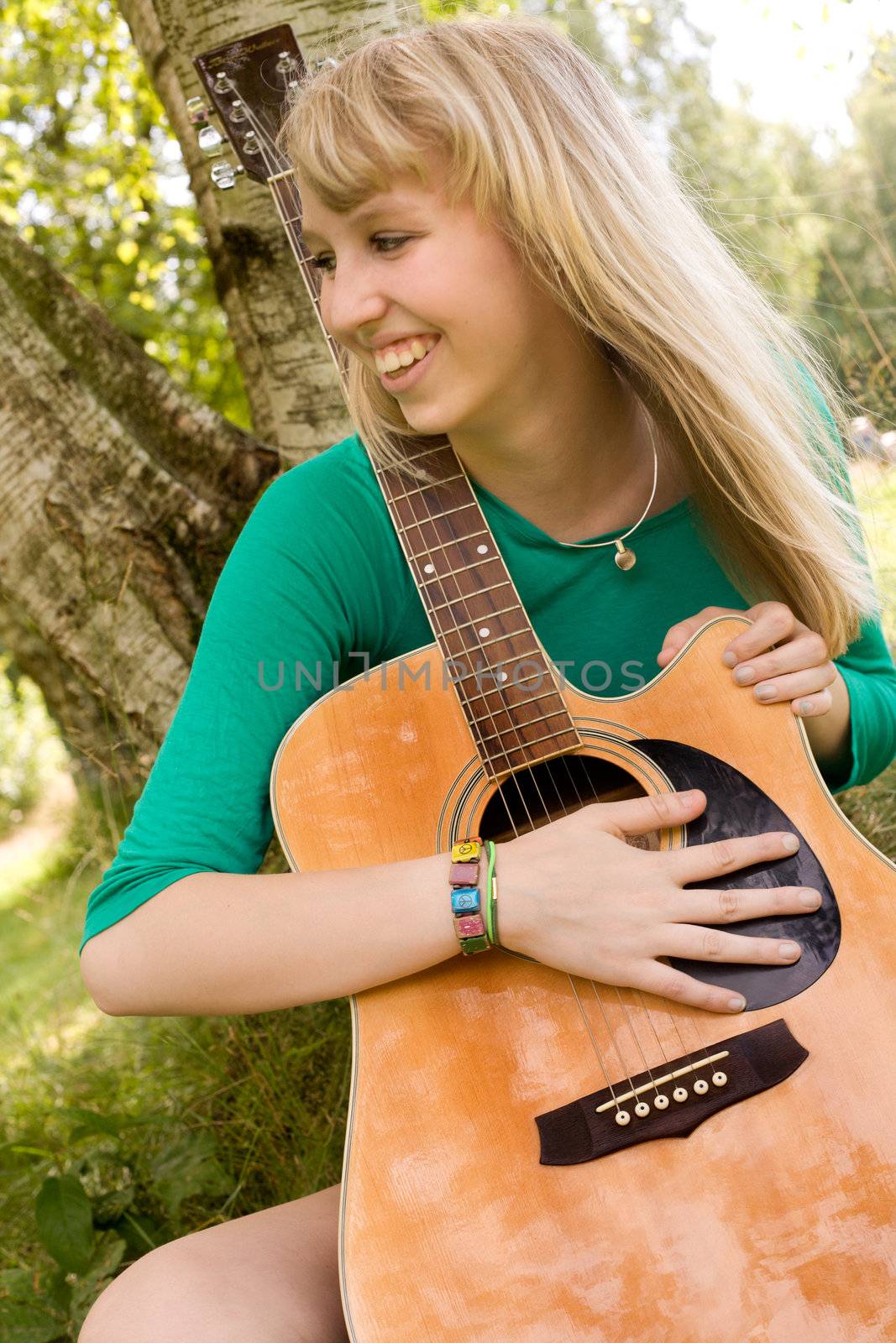 Smiling with her guitar by DNFStyle