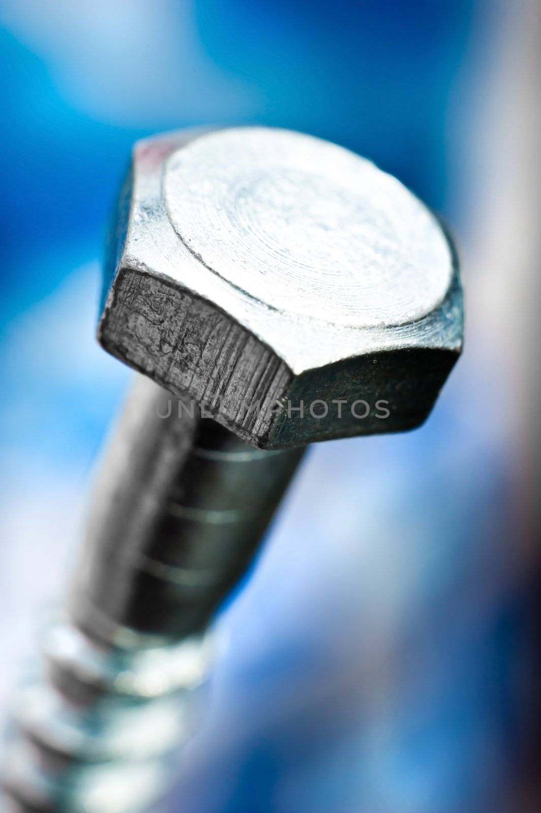 metal bolt heads with blur background