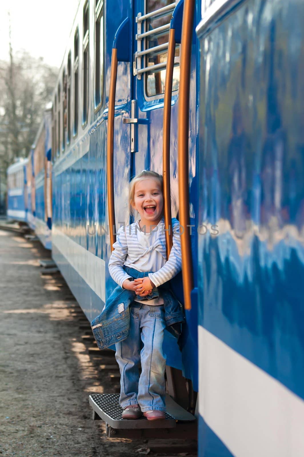 Cute little girl on a train