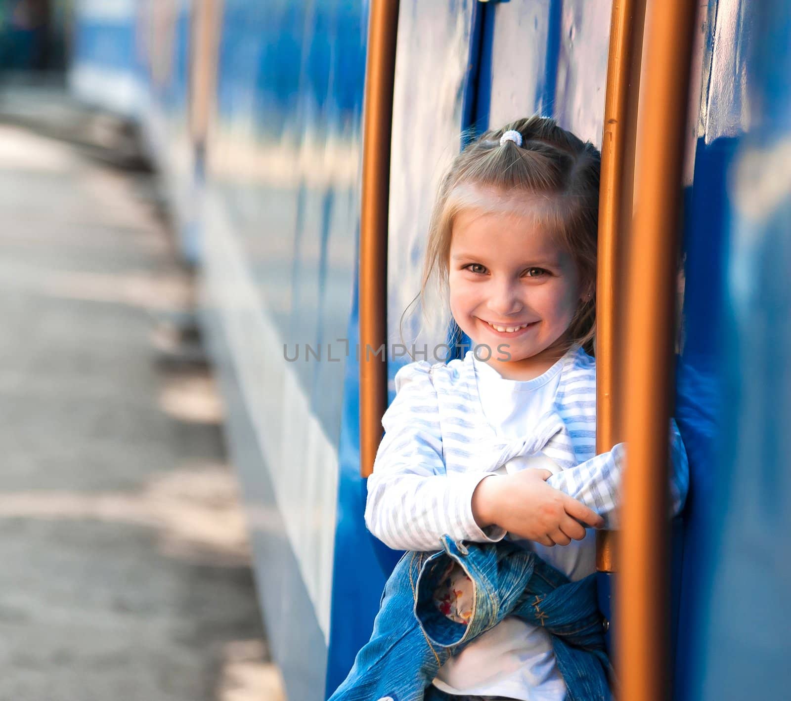 Cute little girl with train