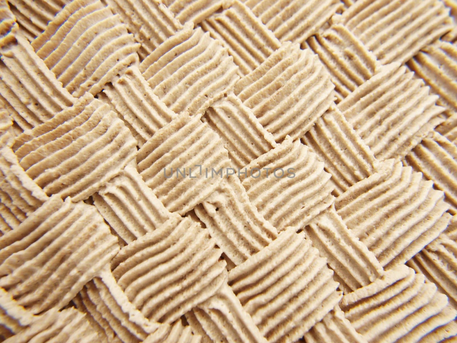 Closeup of a chocolate cream layer cake