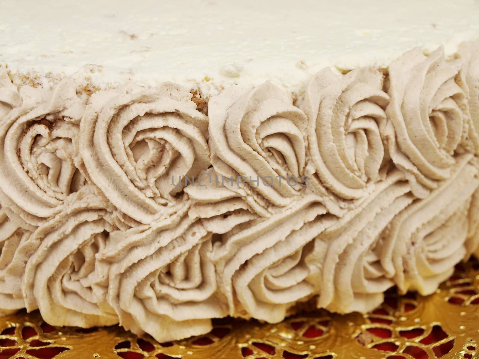 Closeup of a chocolate cream layer cake