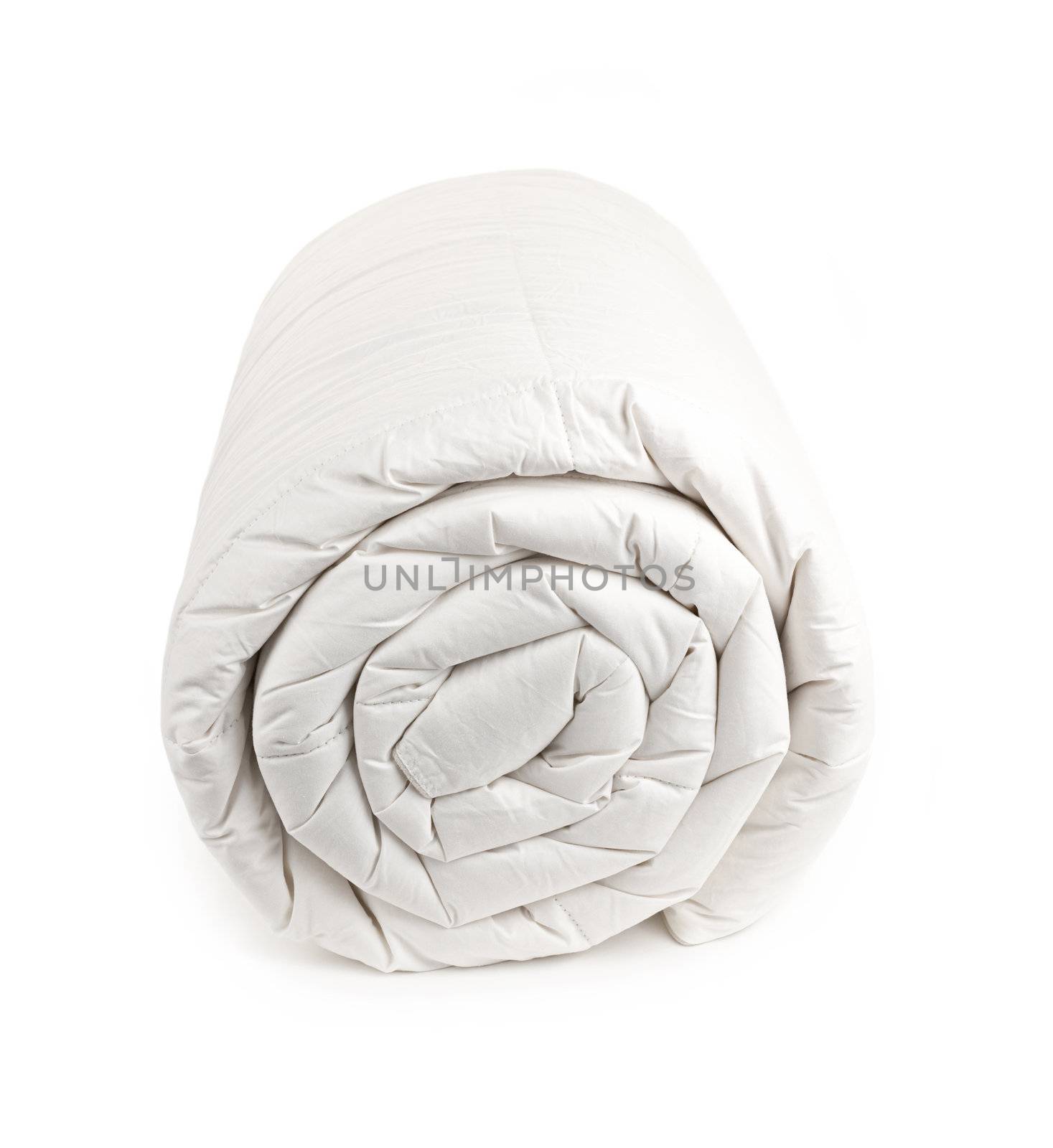 Warm down filled duvet rolled up isolated on white background