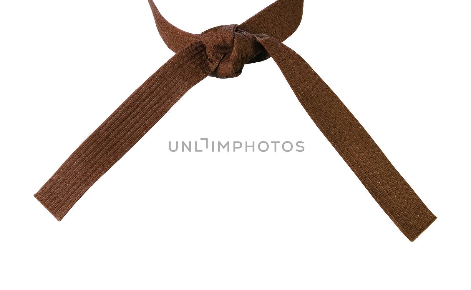 Tied Karate brown belt closeup isolated on white background