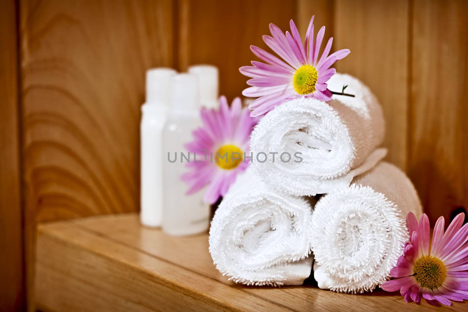White rolled up spa towels by elenathewise