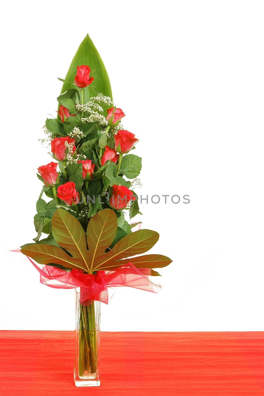 bouquet of eleven red roses in vase 