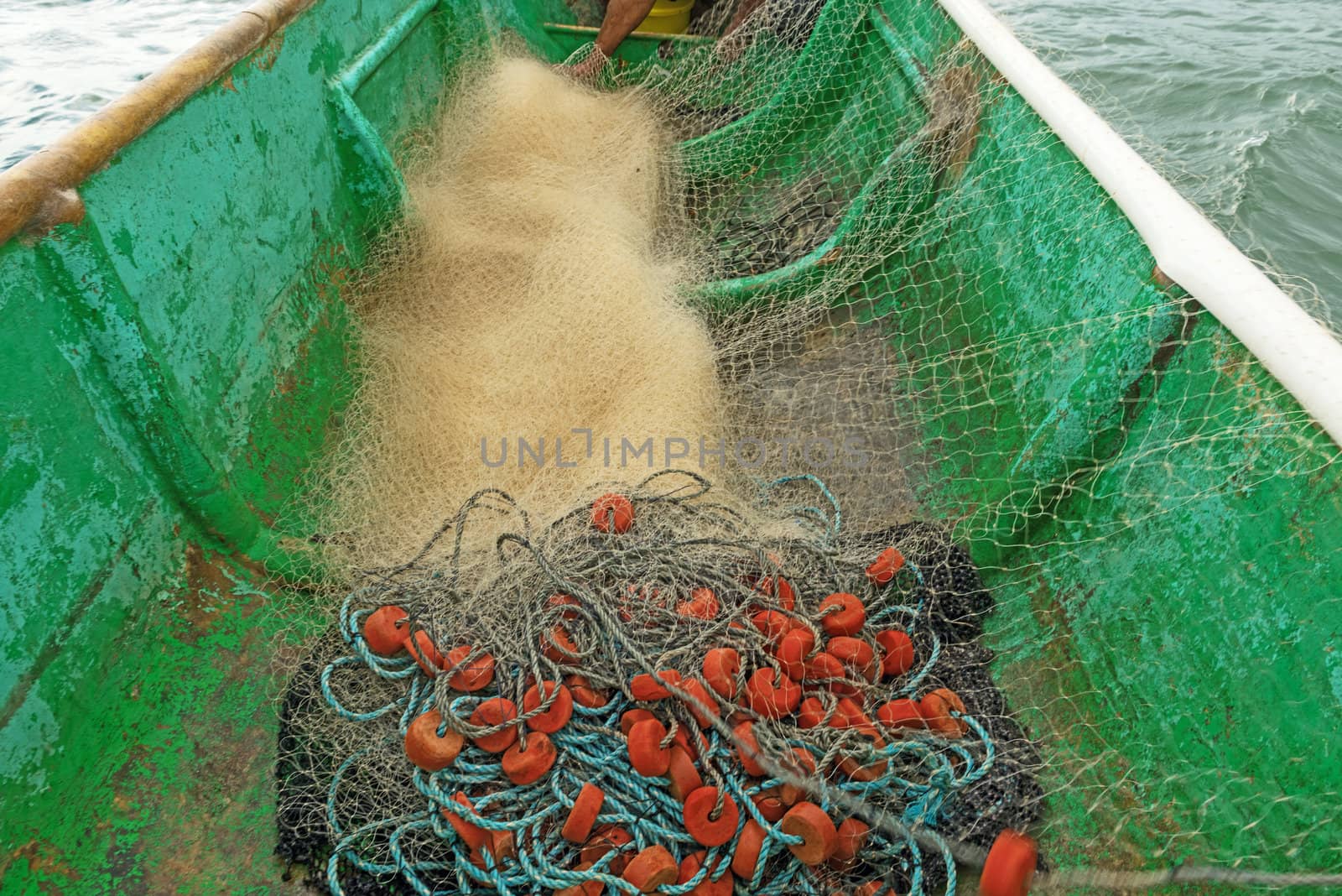 Boat and fishing net by Marcus