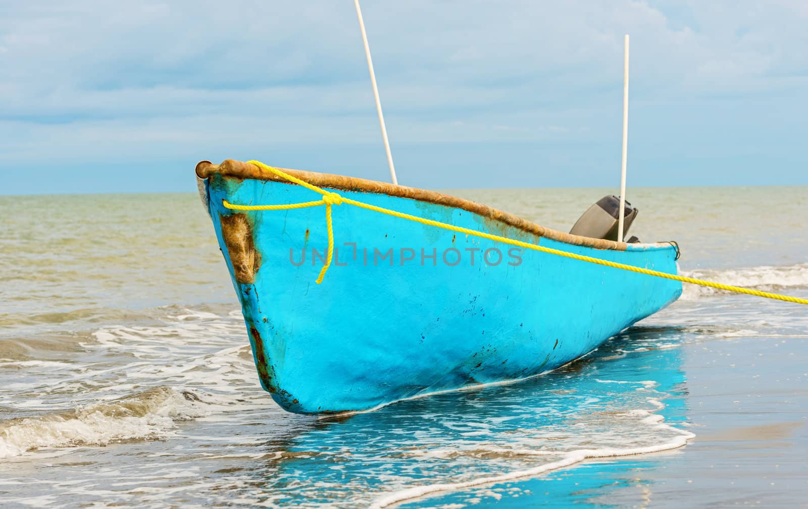 Boat on the shore in El Rompio Panama by Marcus