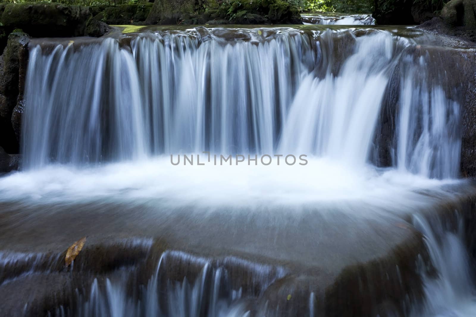 Waterfall in tropical forest, Thailand
