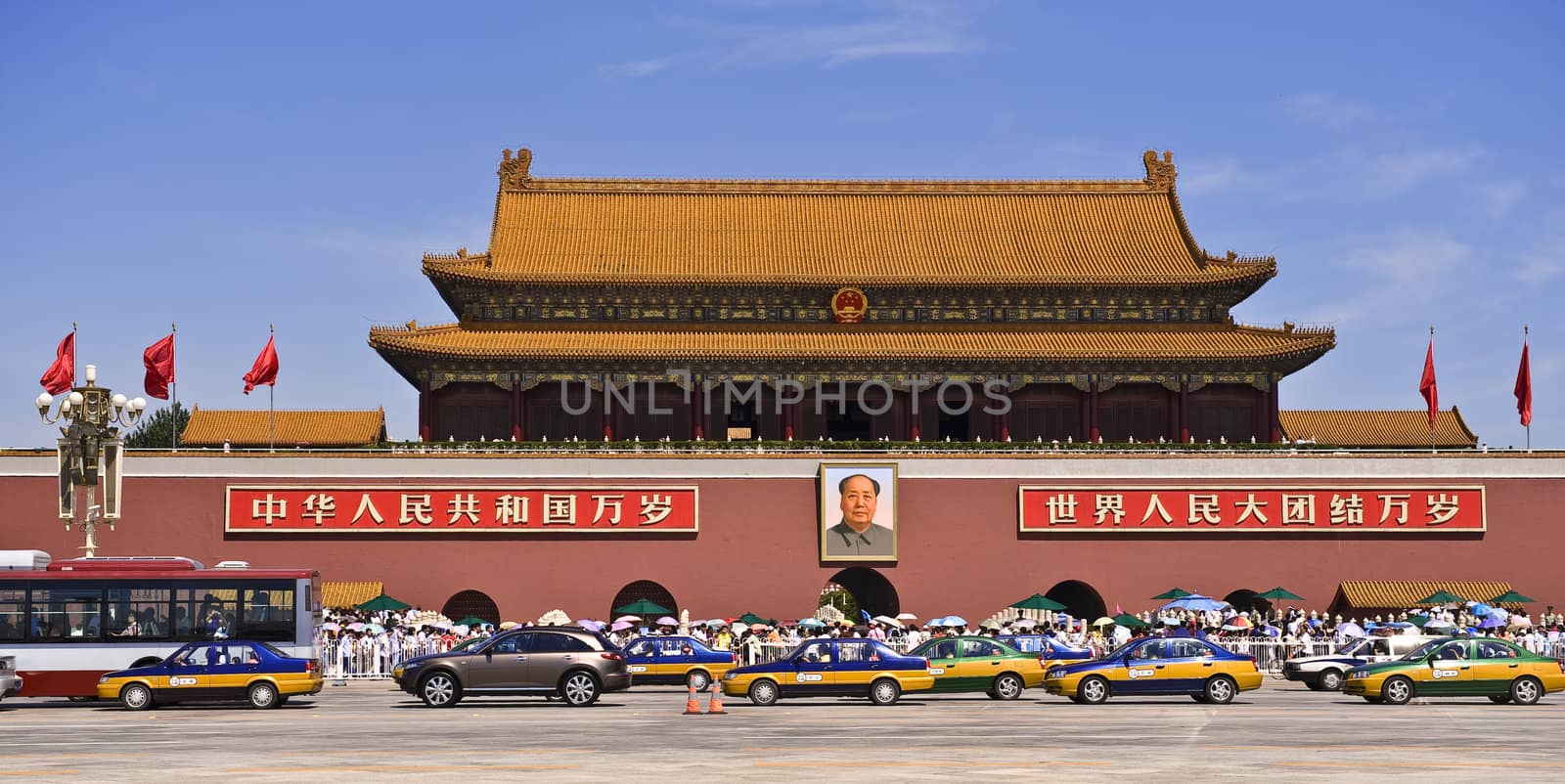 Beijing, China -  Forbidden City entrance with famouse Tien An Men Gate. Crowd of tourists in foreground, Mao Tse Tung portrait in background
