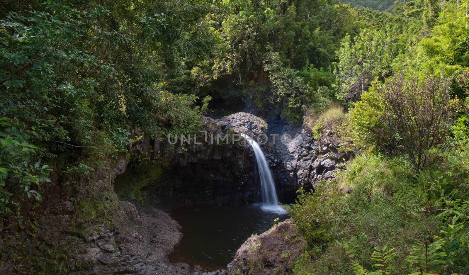 A beautiful tiered waterfall found on the road to Hana - Maui, Hawaii.