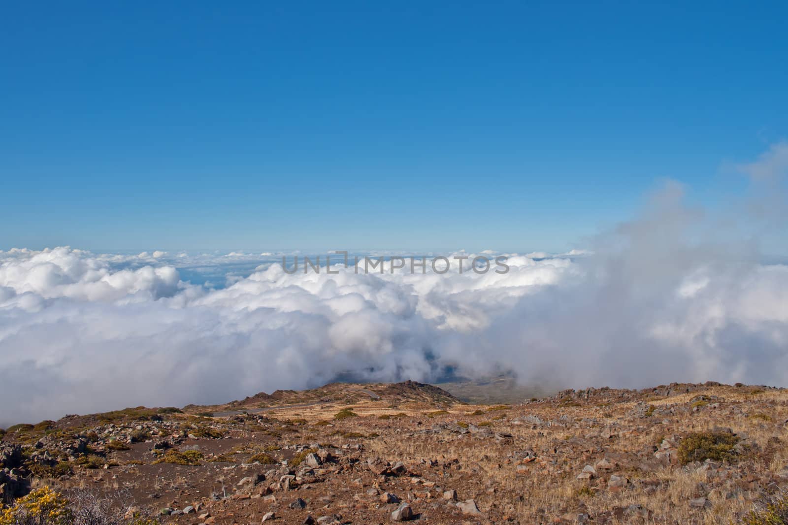 Clouds from above 3000 meters at Maui Volcano crater below