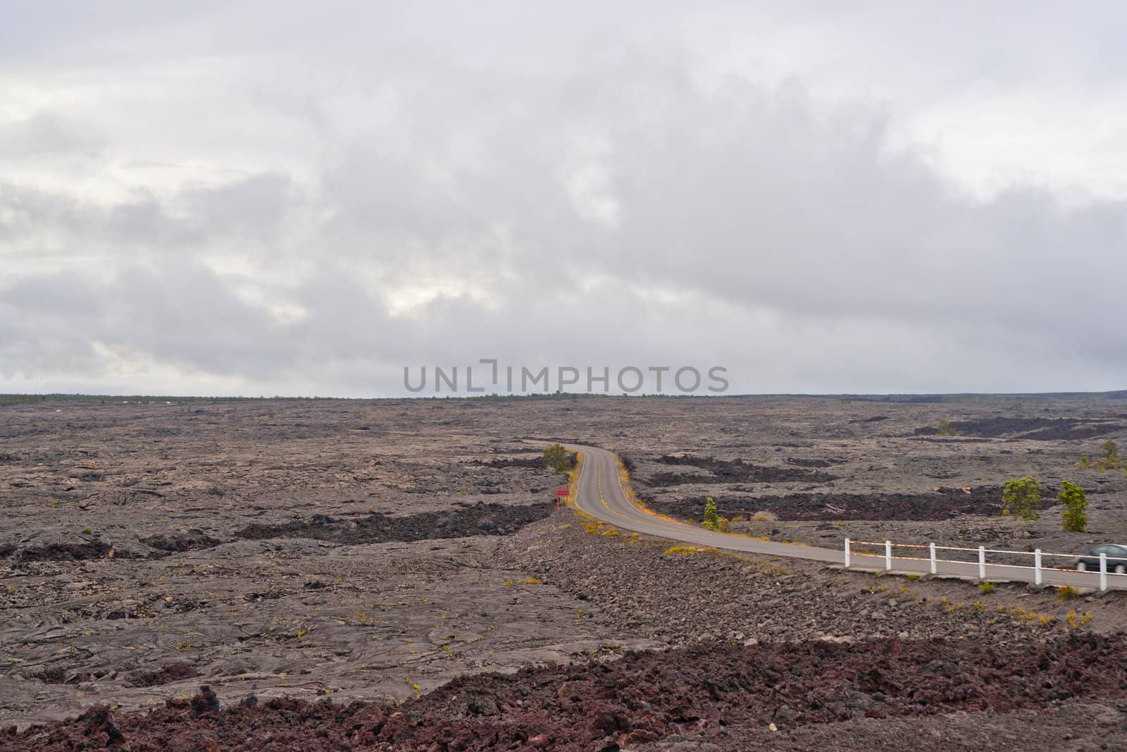Solidified Cracked Lava Flow in Volcano, volcanic landscape when driving Chain of craters road in Big Island of Hawaii