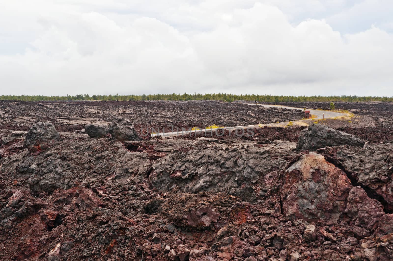 Solidified Cracked Lava Flow in Volcano, volcanic landscape when driving Chain of craters road in Big Island of Hawaii