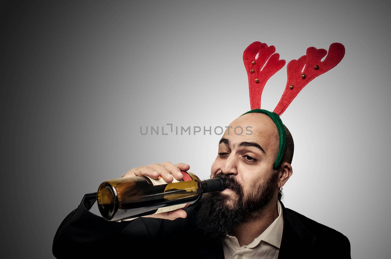 drunk modern elegant santa claus babbo natale on grey background