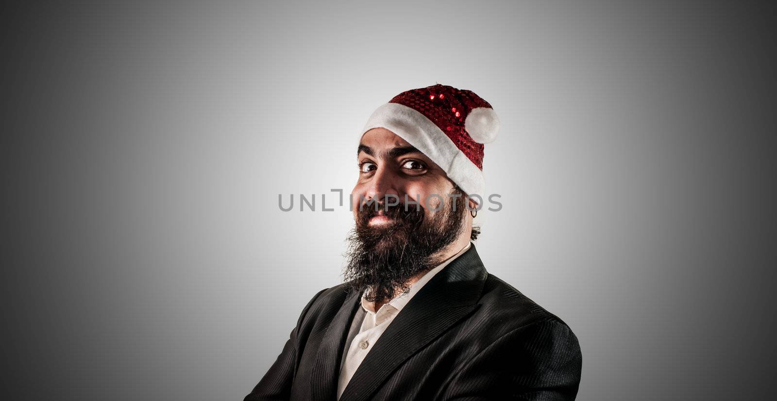 smiling modern elegant santa claus babbo natale on grey background