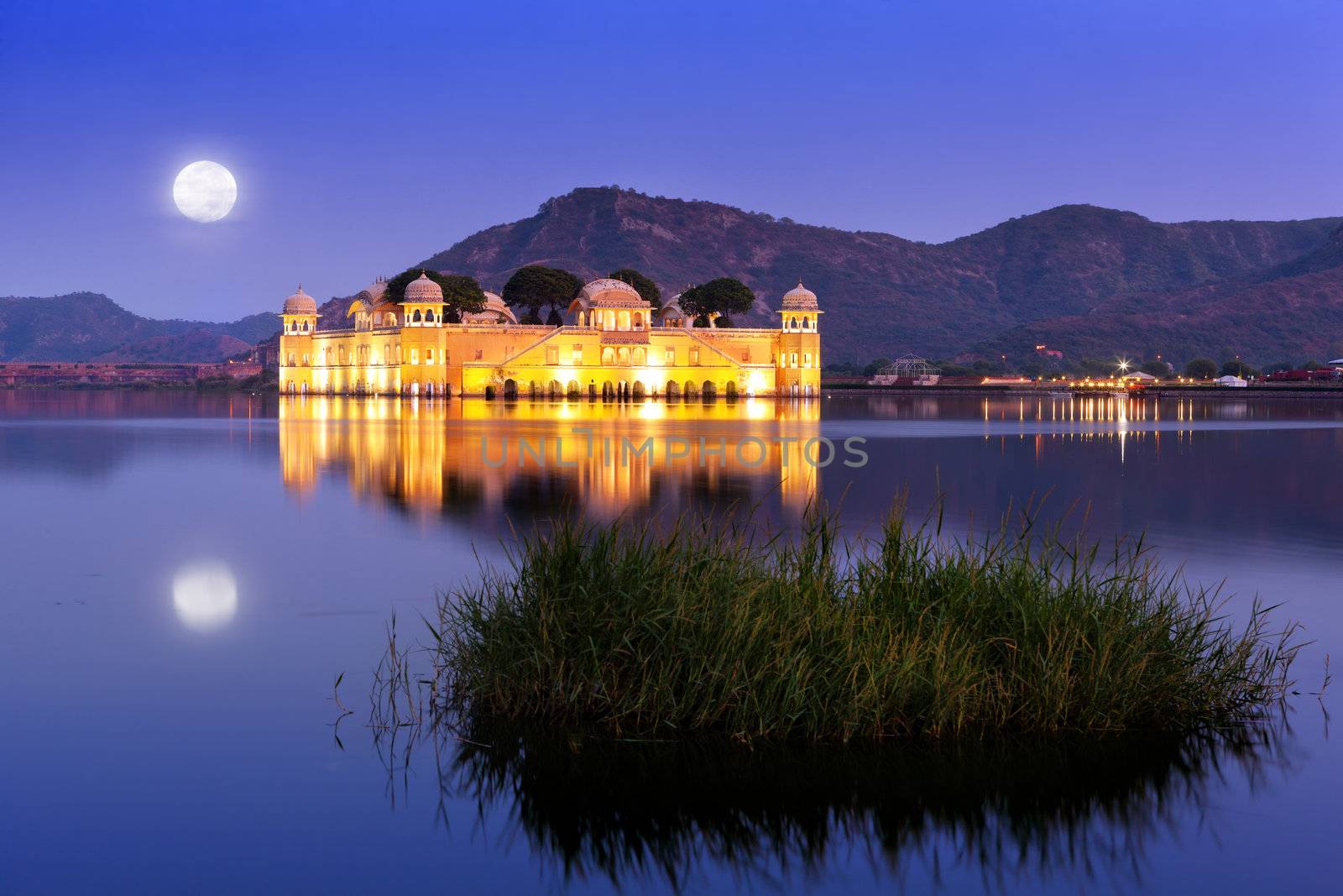 The palace Jal Mahal at night.  Jal Mahal (Water Palace) was built during the 18th century in the middle of Man Sager Lake.  Jaipur, Rajasthan, India.