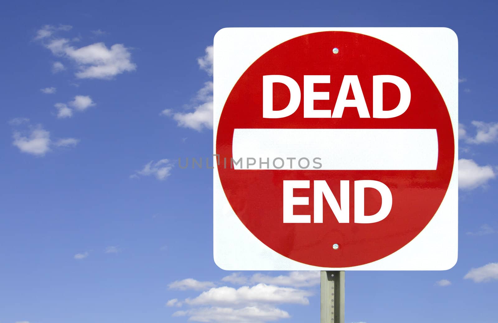 Dead end sign on blue sky, isolated