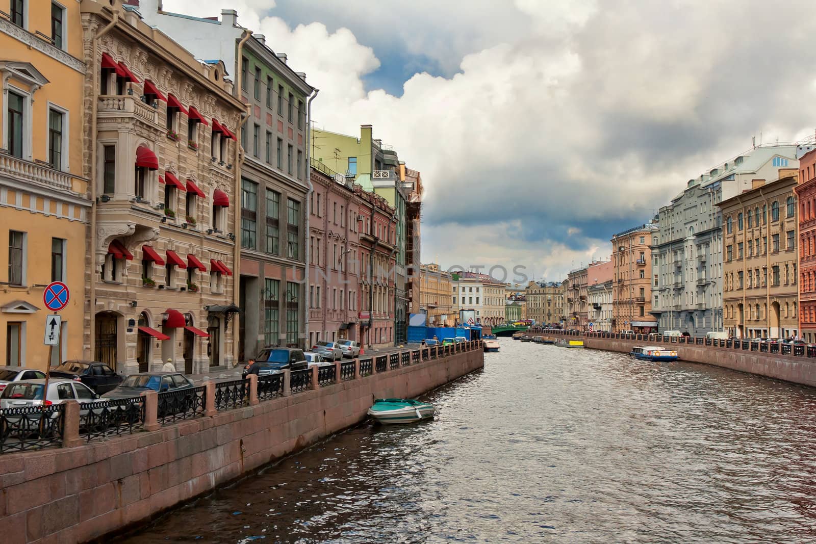 Canal in St. Petersburg against the sky with clouds