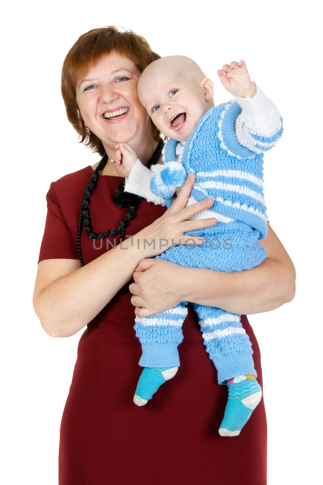 grandmother with her grandson in her arms in the studio on a white background