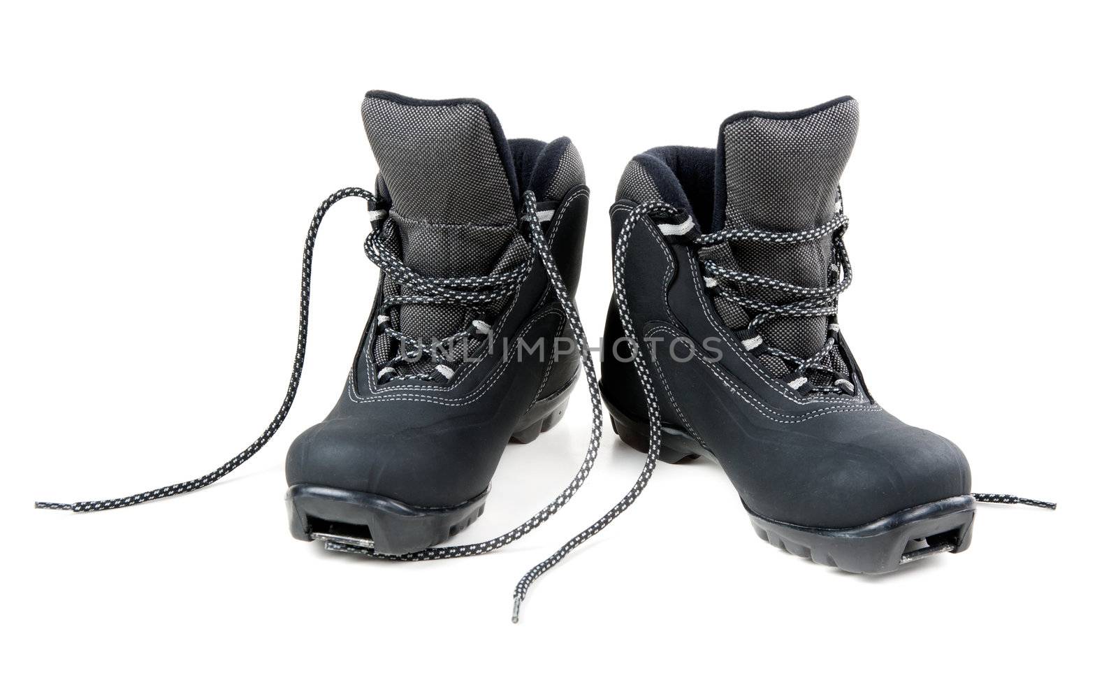 A pair of cross country ski boots isolated on white background