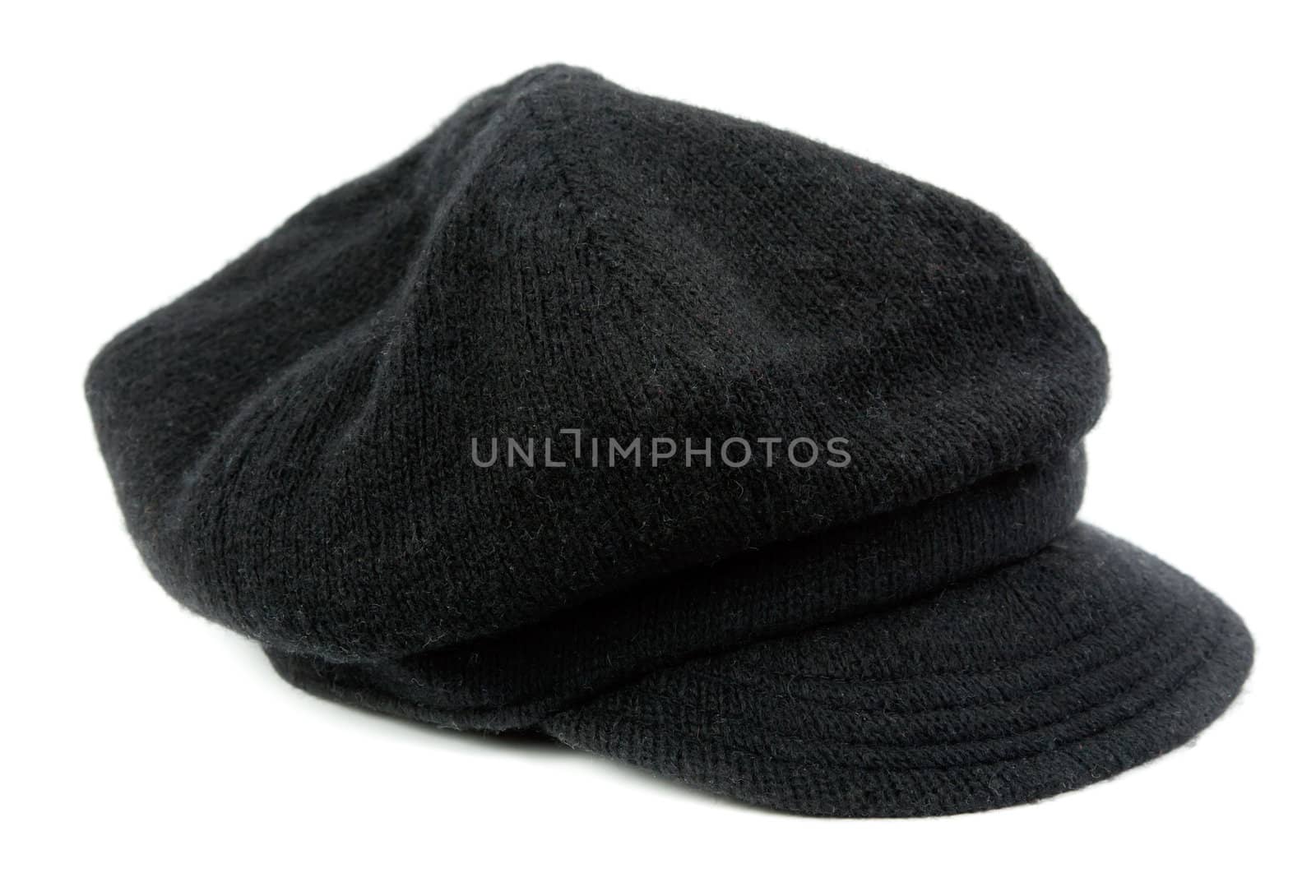 Warm black women's cap in the studio on a white background