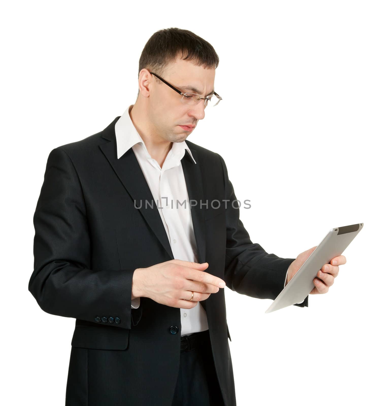businessman with a tablet PC at a loss in the studio on a white background