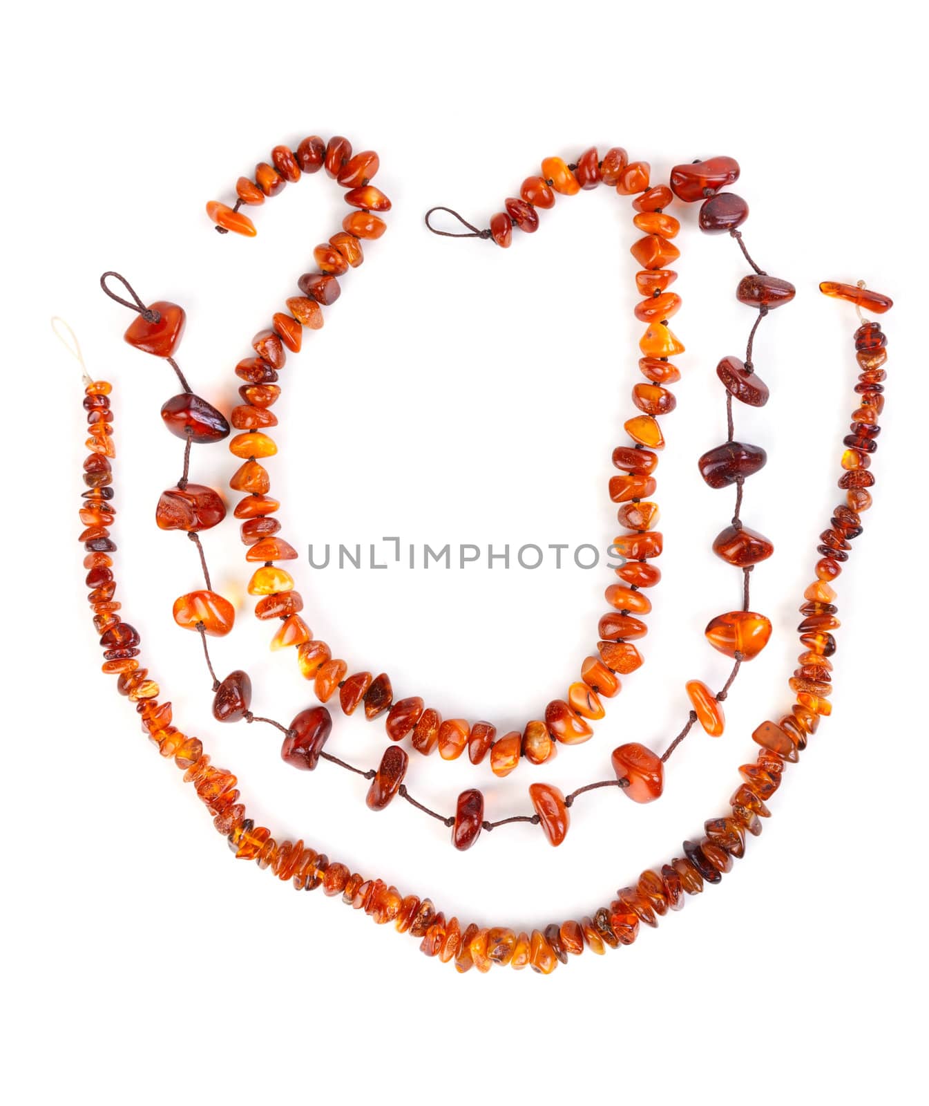 Beads of amber isolated on white background