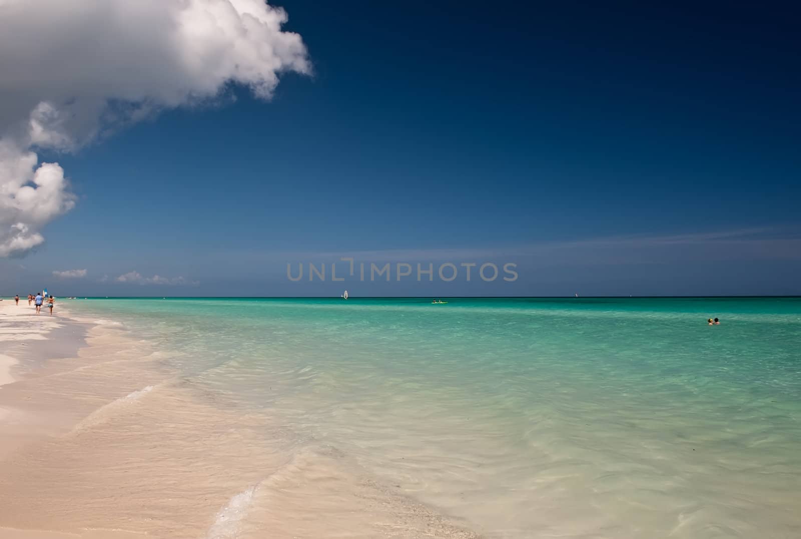 Ocean coastline with blue ocean sky and cloudy overland
