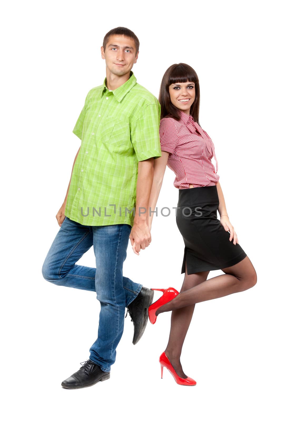 Portrait of a couple in colored plaid dress. Isolate on white background