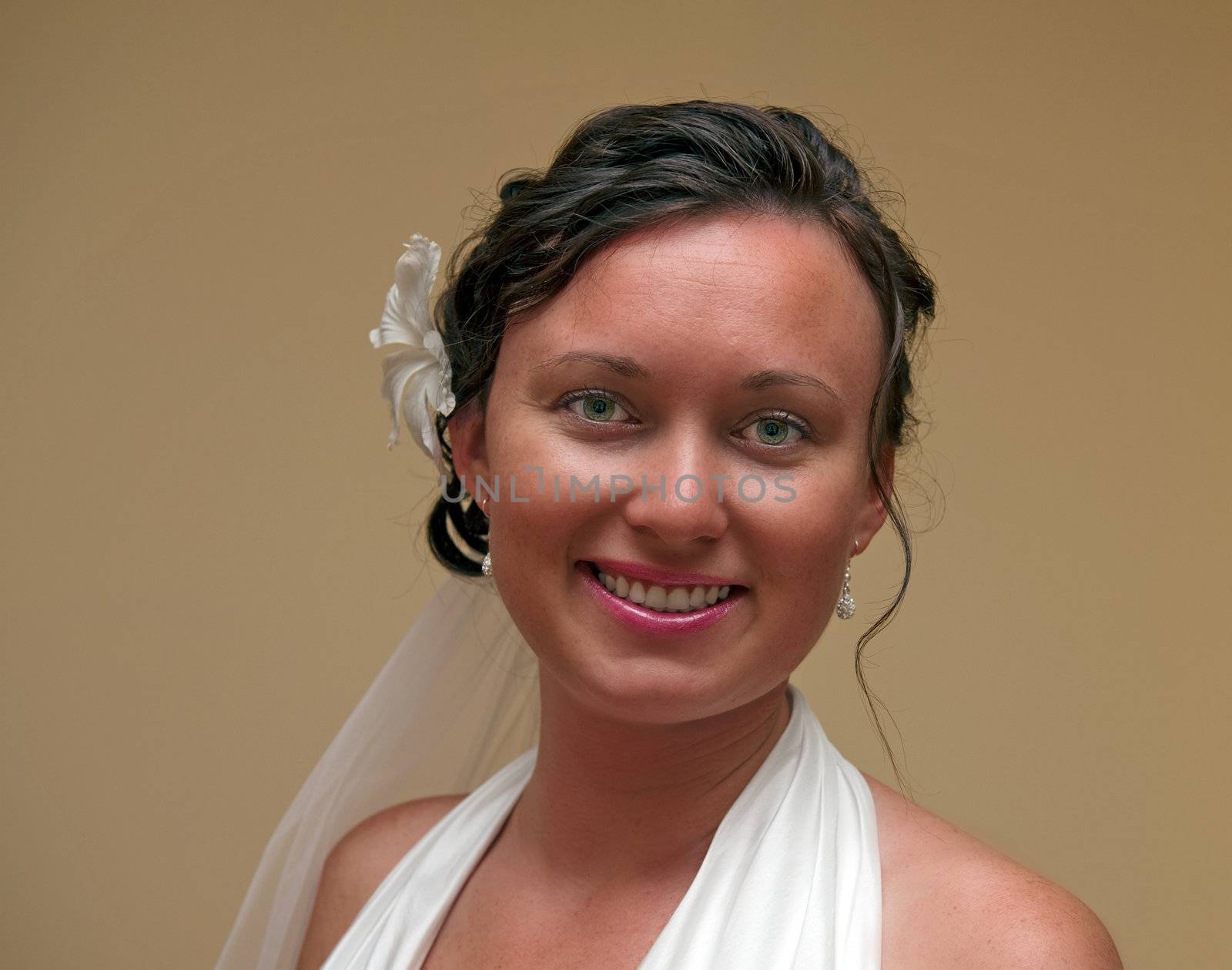 Portrait of young bride indoor setting before ceremony