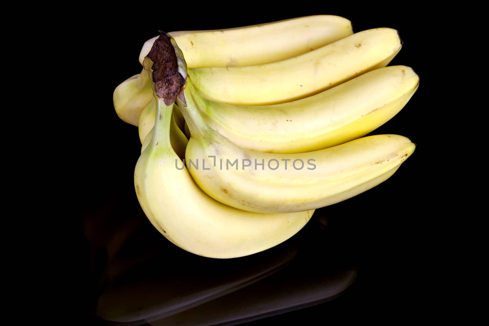 Bunch of fresh bananas the image on black background