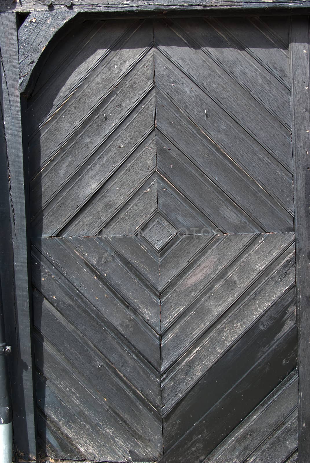 Bright traditional black painted wooden door by Ronyzmbow