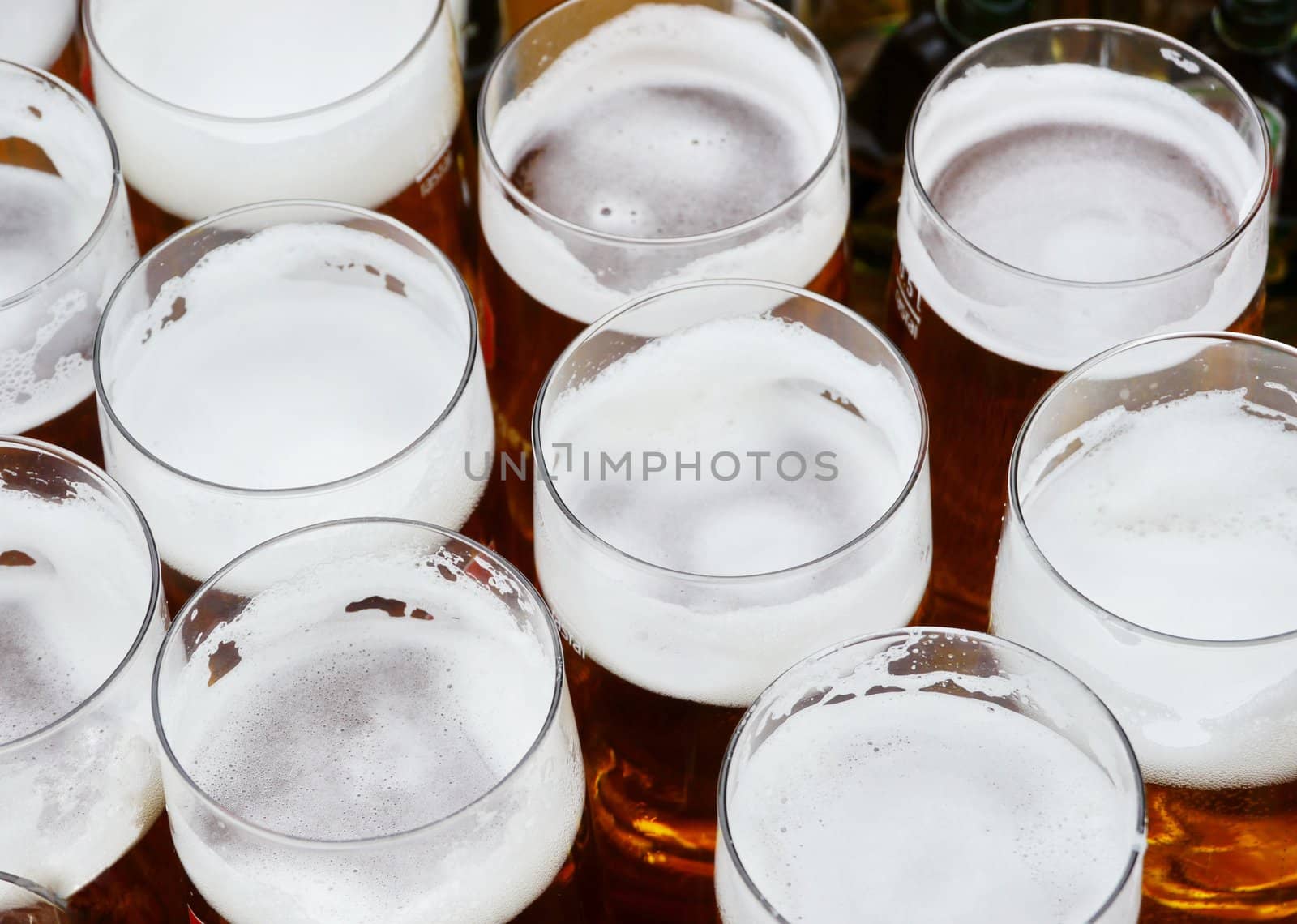 A row of beer pints