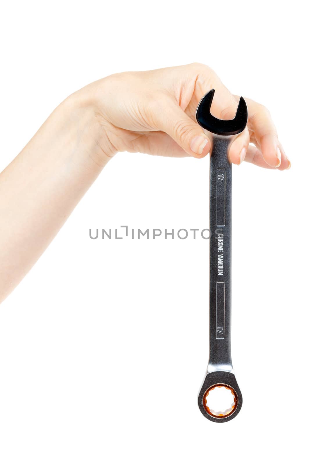 new wrench in female hand. Isolated on white.