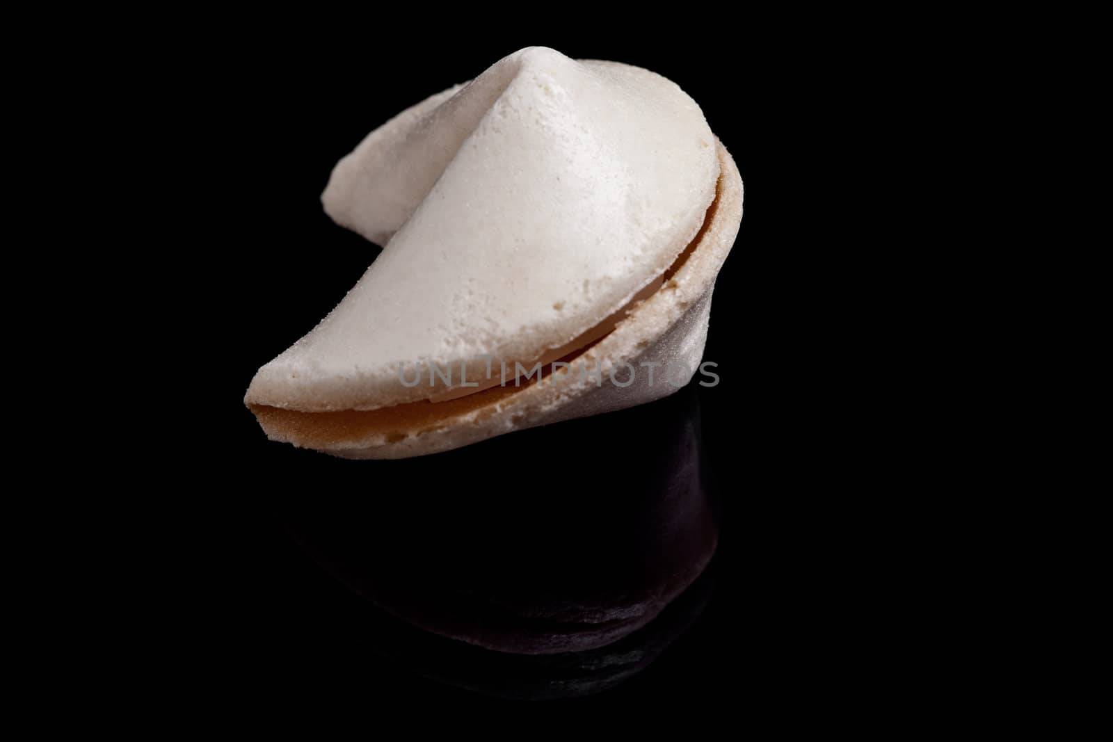 The crispy Fortune cookie image on black background