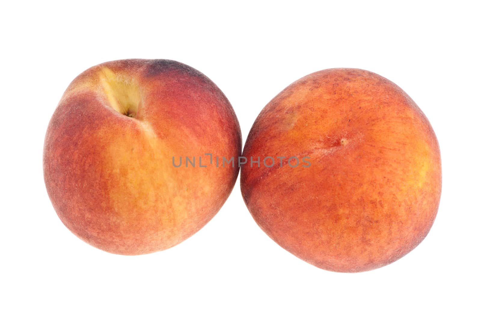 Two fresh peaches image over white background