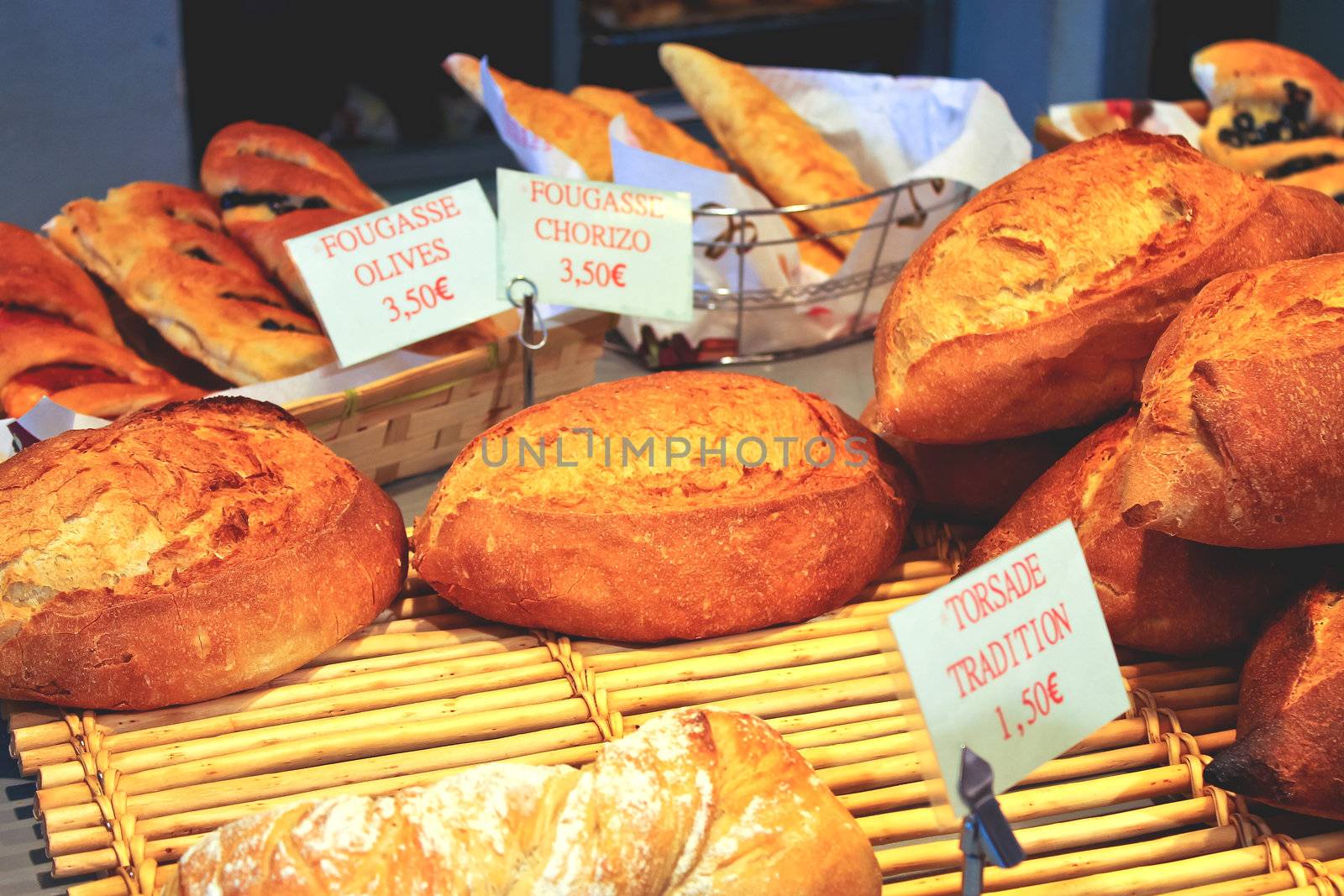 Bread in a shop window by NickNick